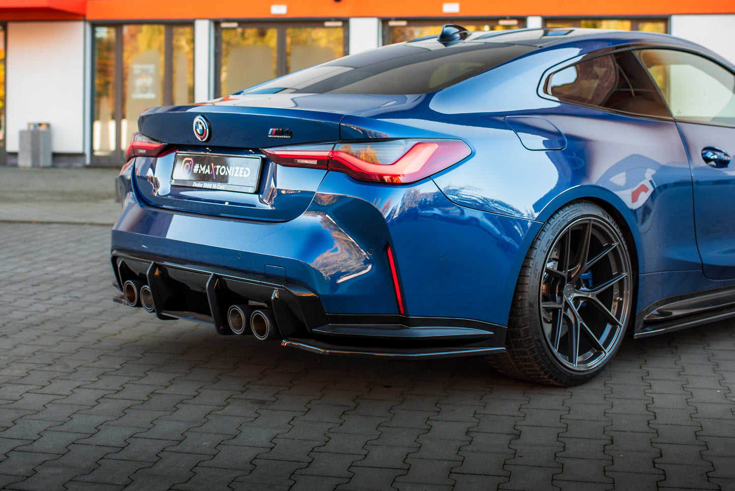 Heck Ansatz Flaps Diffusor V.2 für BMW M4 G82 / G82 Facelift schwarz Hochglanz